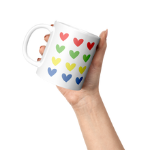 Load image into Gallery viewer, 4_row_multi_hearts_Lifestyle_Raised_Hand_LH_Mockup.png
