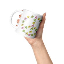 Load image into Gallery viewer, Daisy_Peace_Mug_Lifestyle_Raised_Hand_LH_Mockup.png
